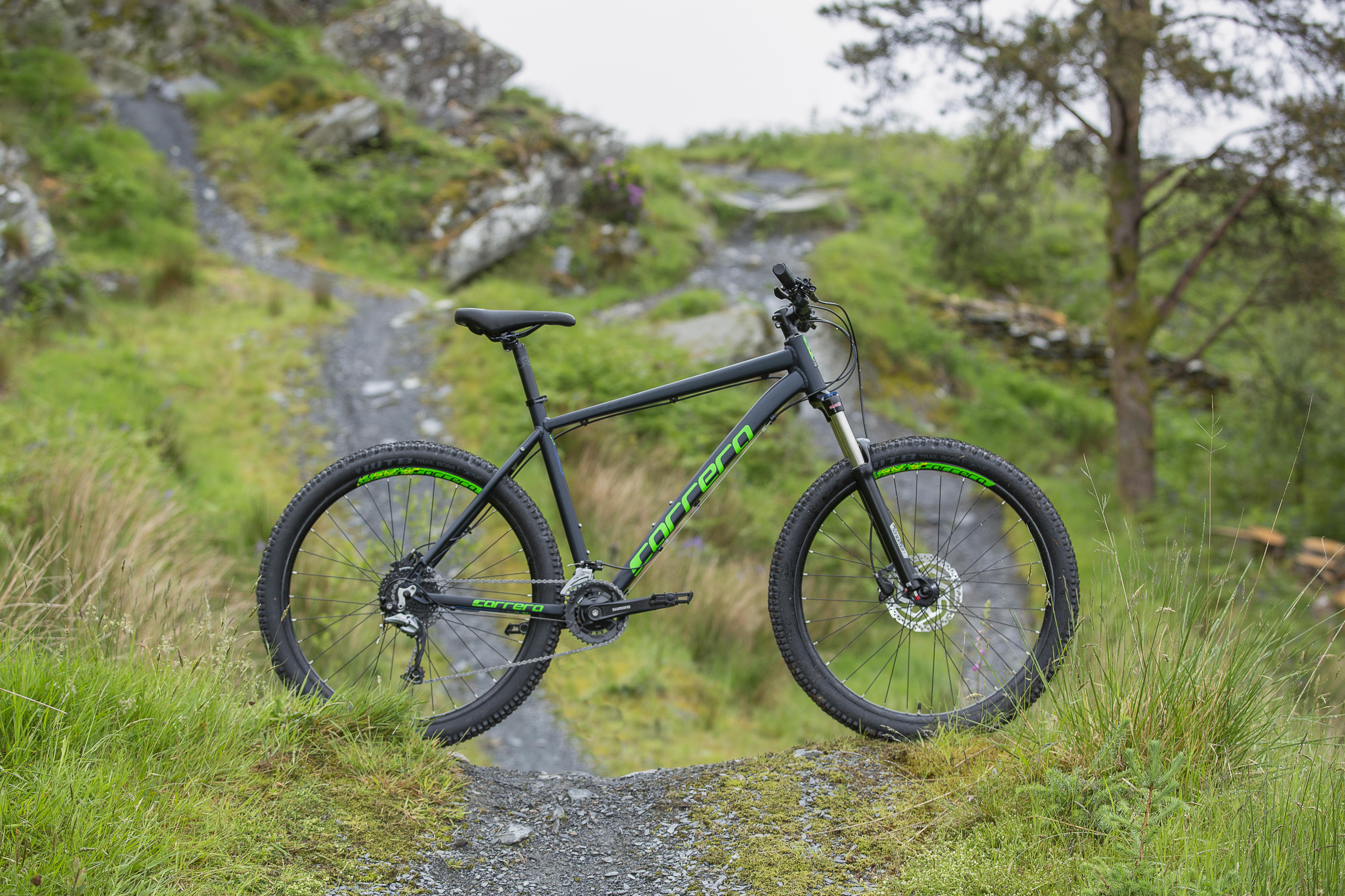 black and blue carrera mountain bike