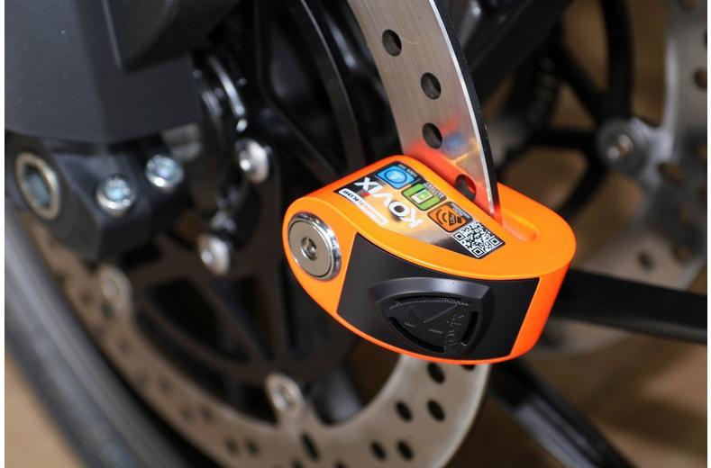 Kovix KD6 6mm 120db Alarm Disc Lock - Fluo Orange Kovix KD6 6mm 120db Alarm Disc Lock - Fluo Orange